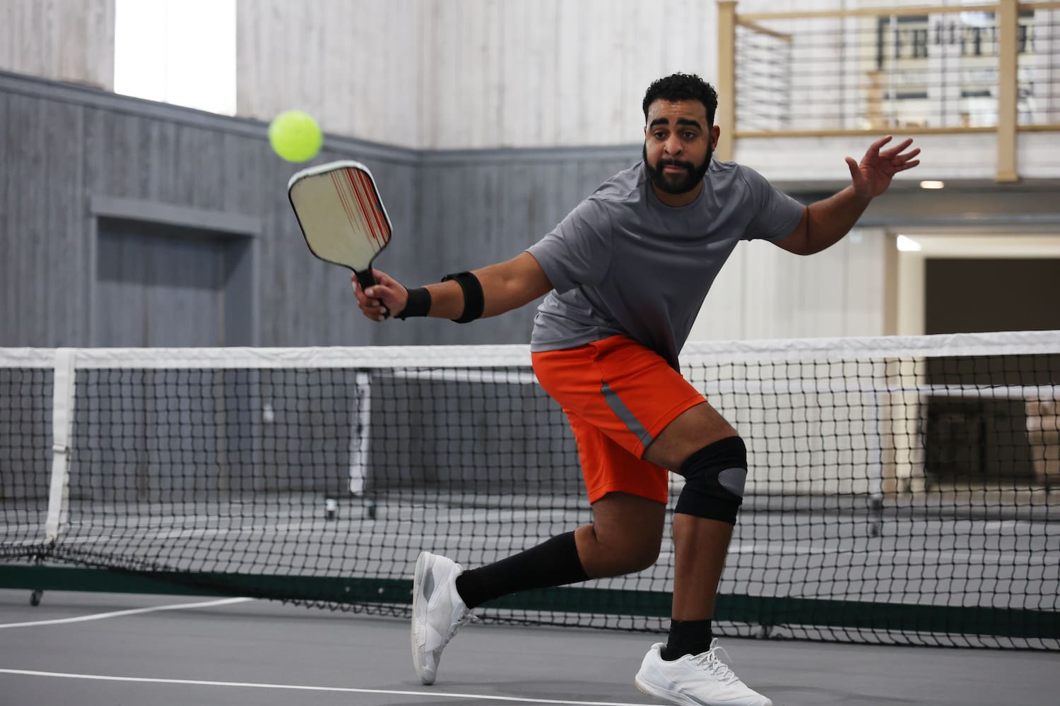 indoor-pickleball-courts-man-playing